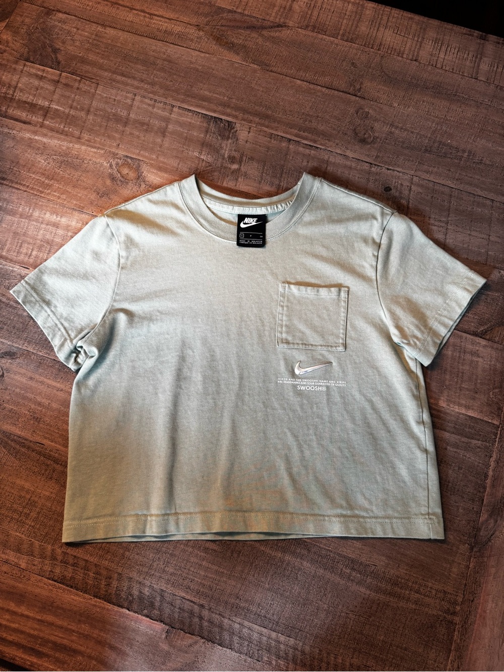 Nike boxy fit tee in color sage.